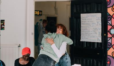 Two women hugging
