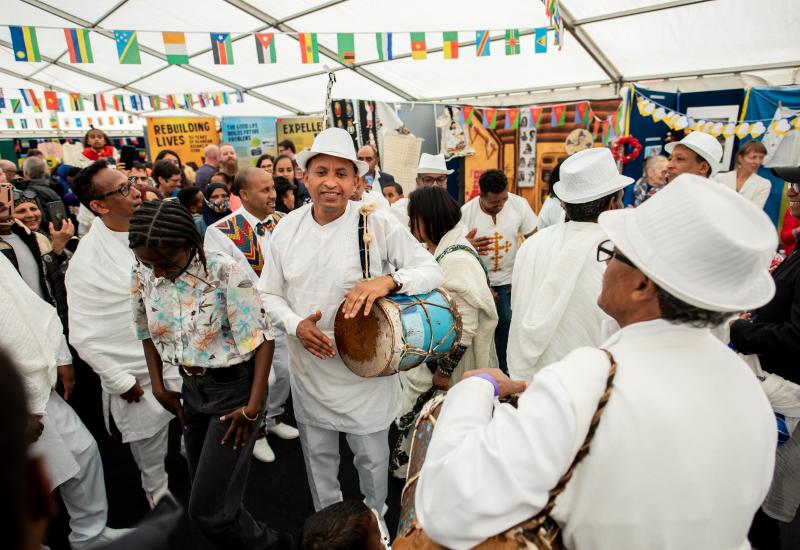 Crowds getting involved in the global village at the Yorkshire Integration Festival 2022